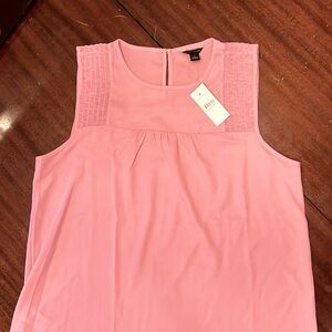 Pink & perfectly paired with blazers.